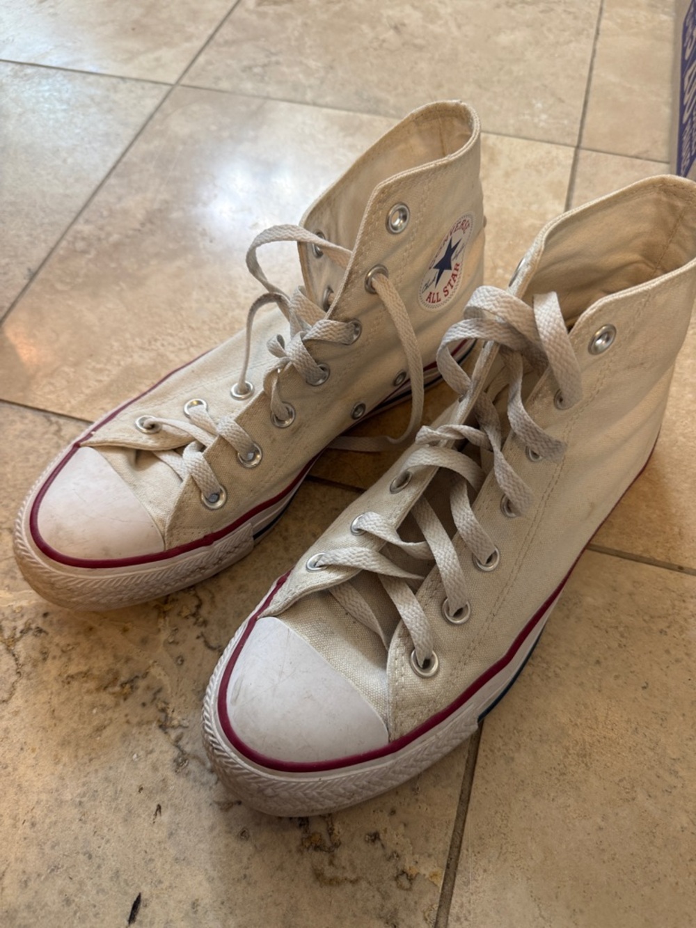 Converse High Top Sneakers in Off-White with Red and Blue Accents